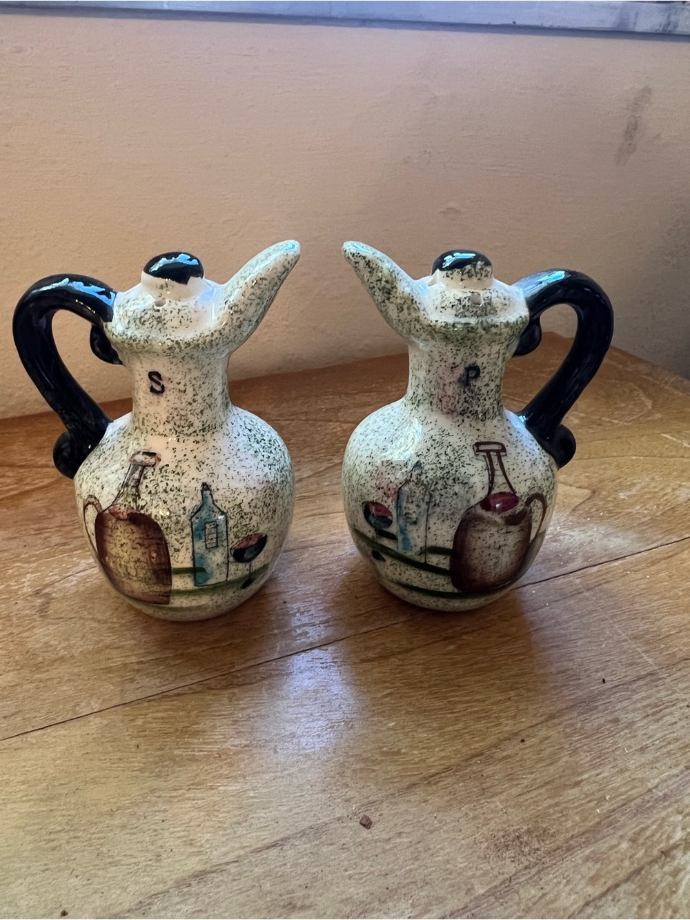 ceramic salt and pepper shakers shaped like miniature cruet pitchers